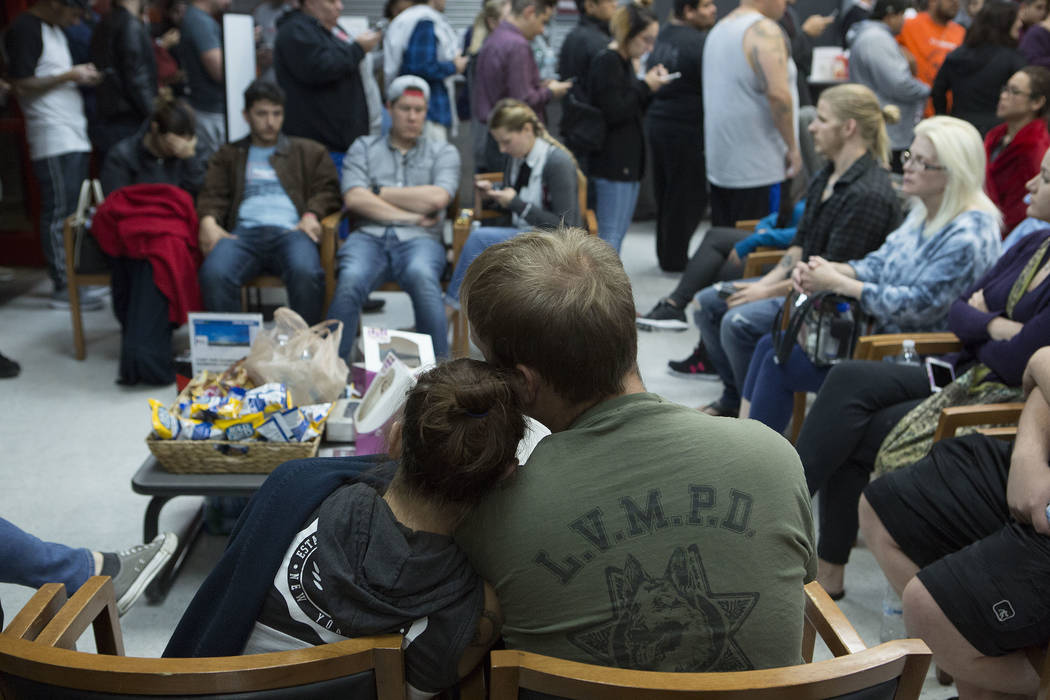 Brittany Hutchinson, left, and Nick Hrustyk wait to donate blood at United Blood Services in Las Vegas Monday, Oct. 2, 2017, following a shooting on the Strip that left 59 dead and over 500 injure ...