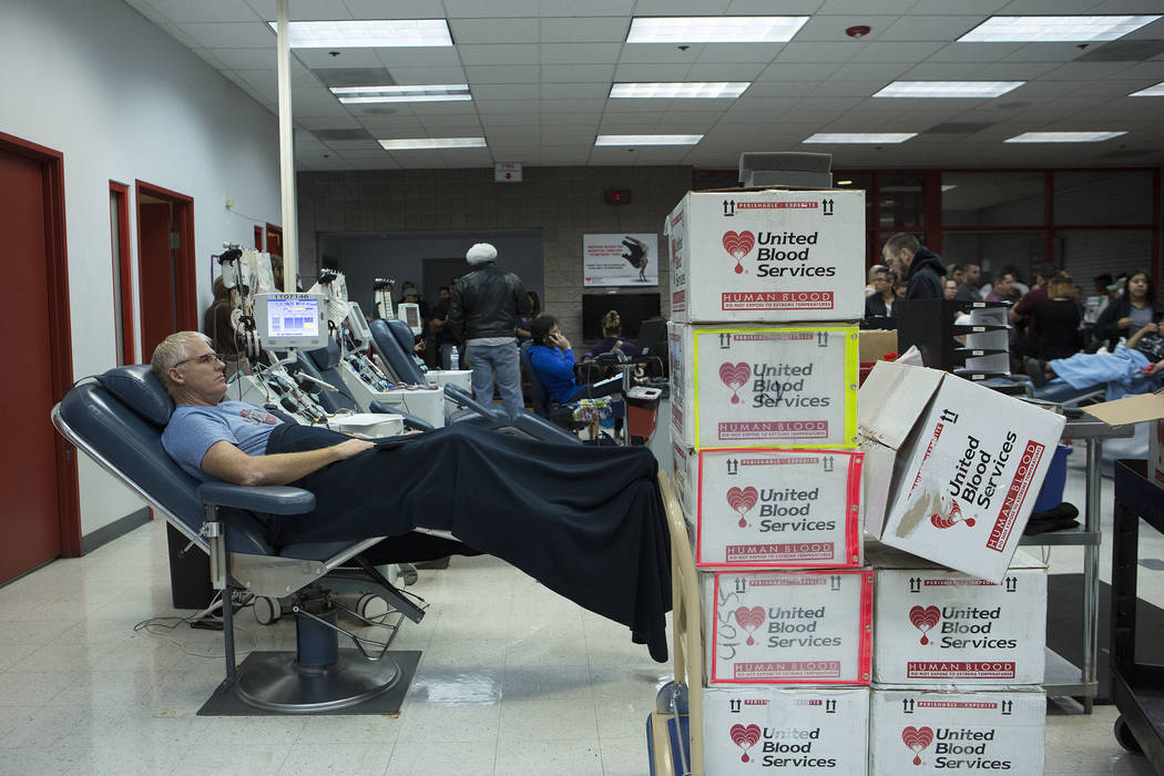 Dan Stocking donates blood at United Blood Services in Las Vegas Monday, Oct. 2, 2017, following a shooting on the Strip that left 59 dead and over 500 injured Sunday night. &quot;It's the lea ...