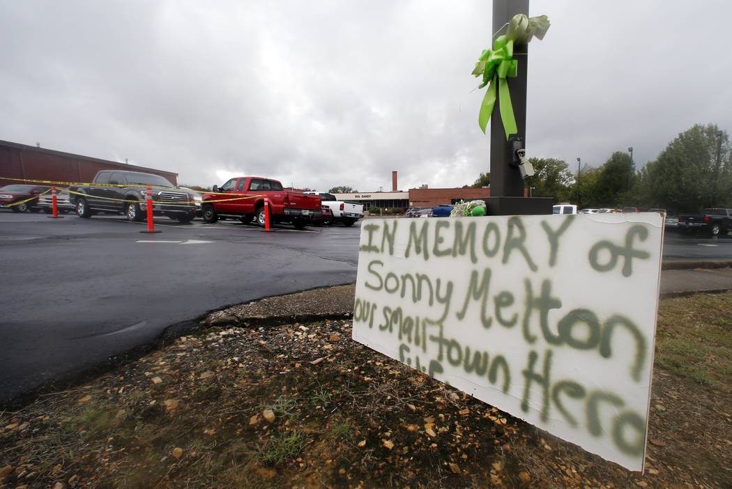A sign is seen outside the school before the funeral for Sonny Melton Tuesday, Oct. 10, 2017, in Big Sandy, Tenn. Melton, of Paris, Tenn., was one of the victims who died in the Oct. 1 mass shooti ...
