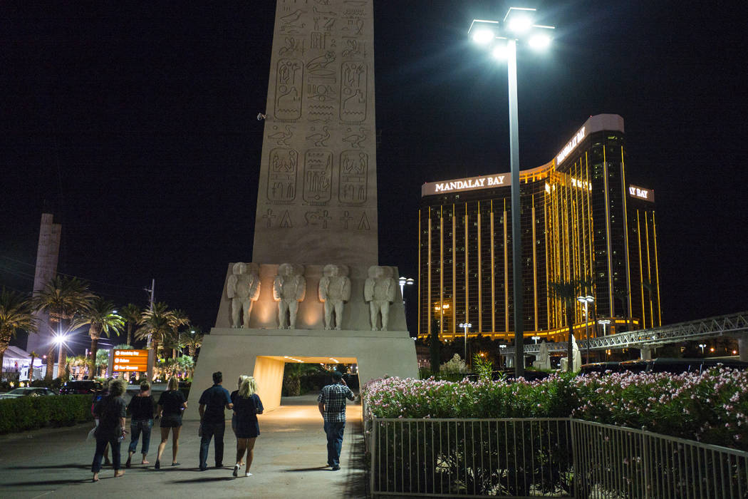 Tourists make their way back to their hotels during the early hours of Monday, Oct. 2, 2017, following an active shooter situation on the Las Vegas Strip. (Chase Stevens/Las Vegas Review-Journal) ...