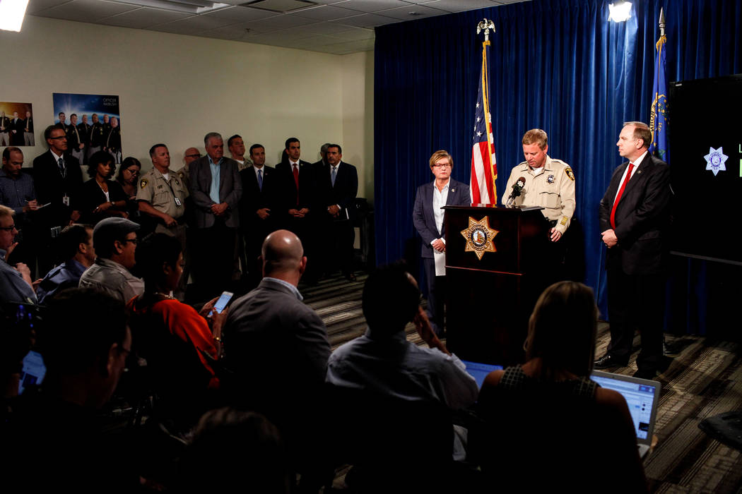 Jill Snyder, special agent for the U.S. Bureau of Alcohol Tobacco and Firearms, left, Las Vegas Metro Police Department Undersheriff Kevin McMahill, center, and FBI Special Agent Aaron Rouse, righ ...