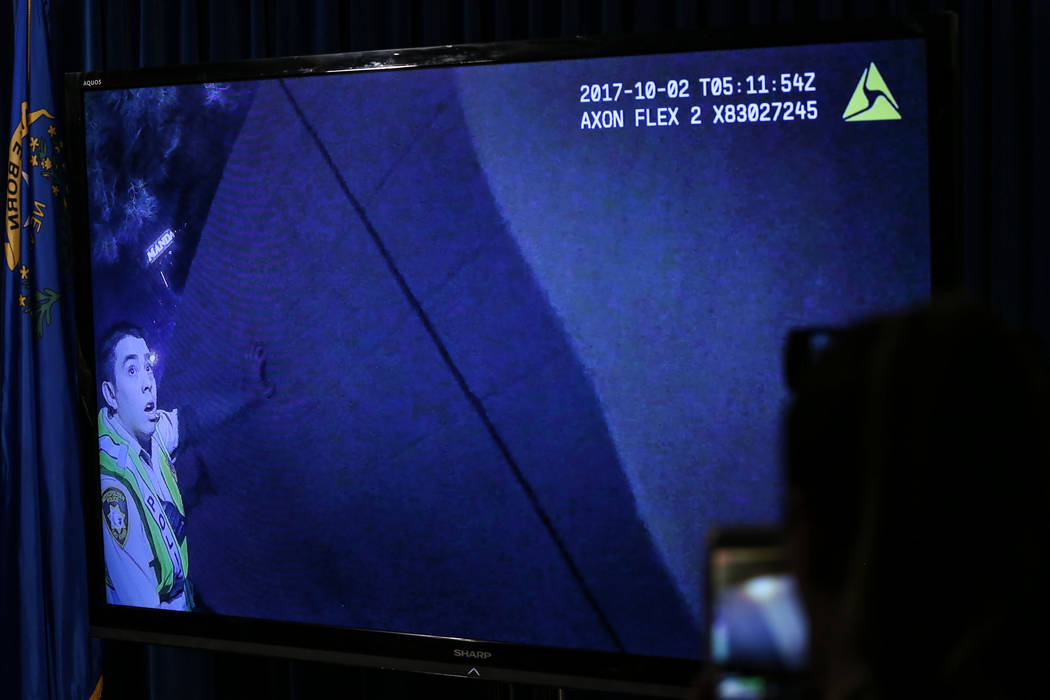 Body camera footage from Sunday night's mass shooting is presented during a press conference at the Las Vegas Police Department headquarters in Las Vegas, Tuesday, Oct. 3, 2017. Joel Angel Juarez  ...