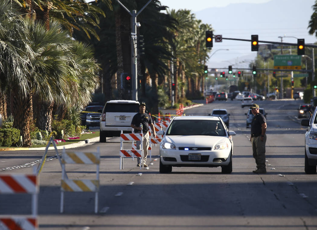 FBI officers near the Route 91 music festival grounds along Las Vegas Boulevard near Reno Avenue in Las Vegas on Tuesday, Oct. 3, 2017. A gunman opened fire on attendees of a music festival Sunday ...