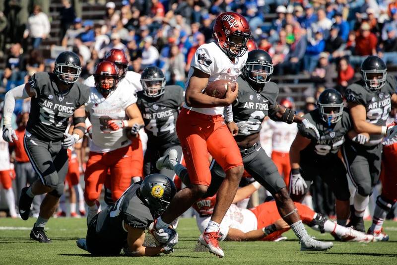 Oct 14, 2017; Colorado Springs, CO, USA; UNLV Rebels quarterback Armani Rogers (1) is tied up by Air Force Falcons defensive back Jeremy Fejedelem (27) as linebacker Shaquille Vereen (6) defends i ...