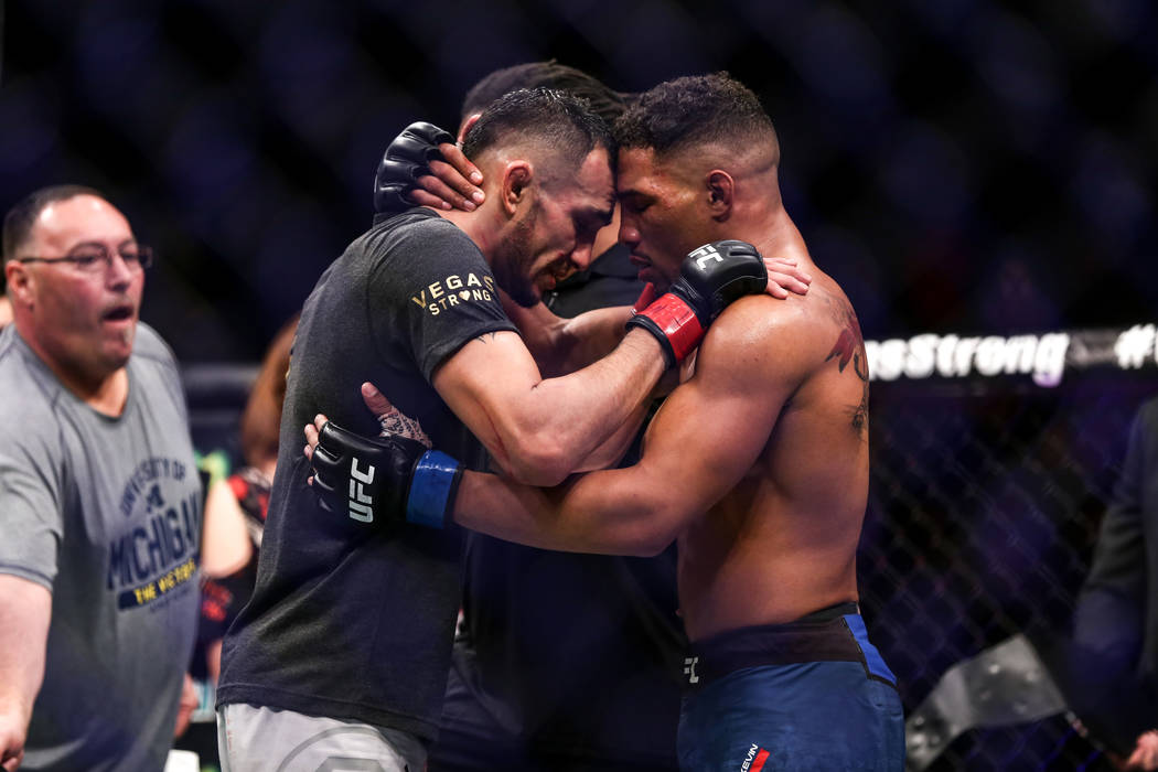 Tony Ferguson, left, and Kevin Lee, right, congratulate each other after  the interim lightweight championship bout UFC 216 at T-Mobile Arena in Las  Vegas, Saturday, Oct. 7, 2017. Ferguson won by s … |