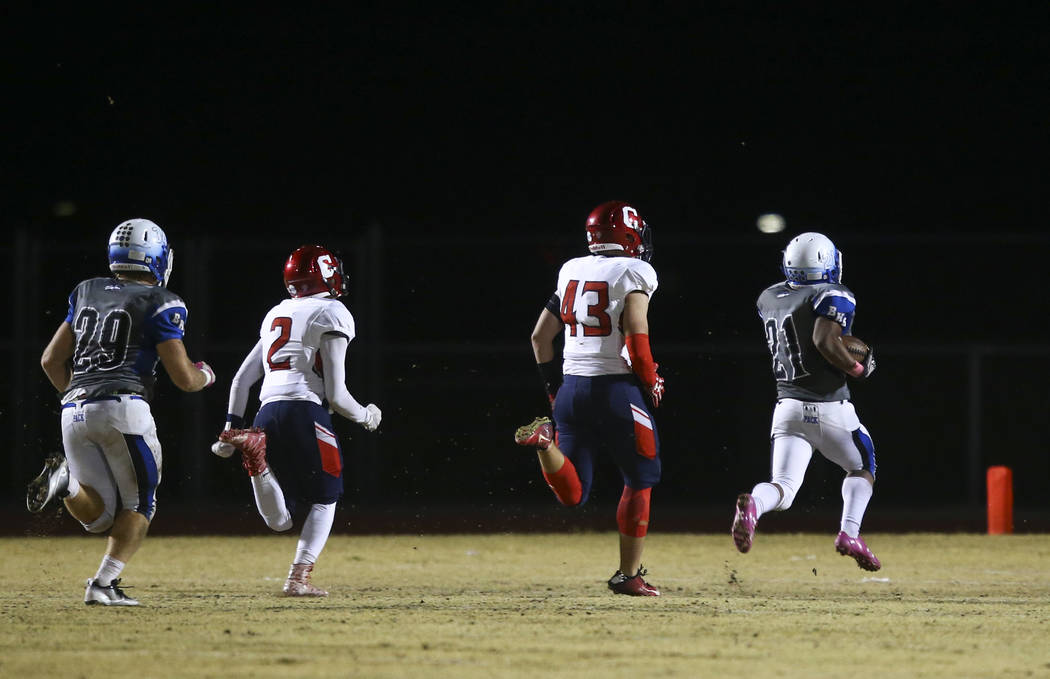 Basic's Dorian McAllister (21) heads for the end zone to score a touchdown against Coronado during a football game at Basic High School in Henderson on Friday, Oct. 6, 2017. Basic won 45-22. Chase ...