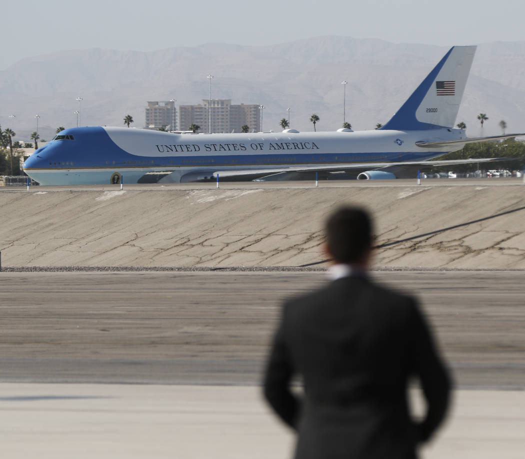 Air Force One arrives at McCarran International Airport in Las Vegas on Wednesday, Oct. 4, 2017. A gunman opened fire on attendees of a music festival Sunday night, resulting in the death of 59 pe ...