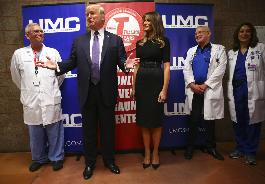 President Donald Trump and First Lady Melania Trump after visiting victims at University Medical Center in Las Vegas on Wednesday, Oct. 4, 2017. A gunman opened fire on attendees of a music festiv ...