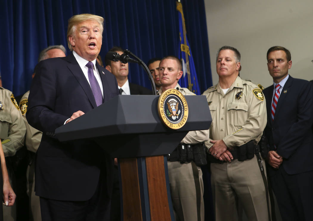 President Donald Trump speaks at Metropolitan Police Department headquarters in Las Vegas on Wednesday, Oct. 4, 2017. A gunman opened fire on attendees of a music festival Sunday night, resulting  ...