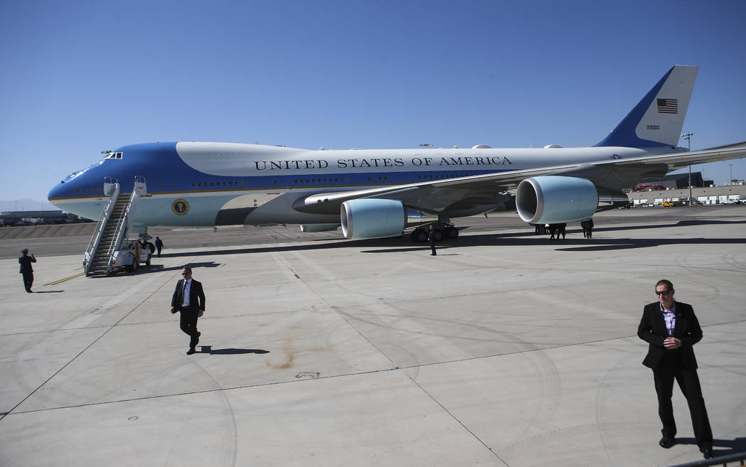 Air Force One prepares to depart from McCarran International Airport after President Donald Trump visited with victims and first responders in Las Vegas on Wednesday, Oct. 4, 2017. A gunman opened ...