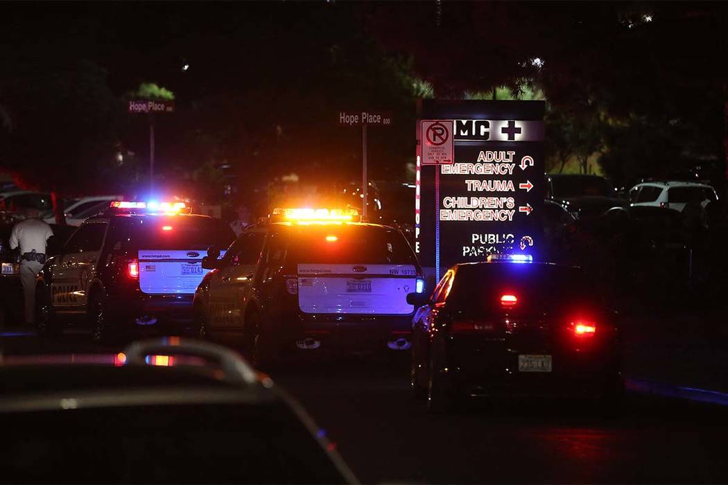 Officers are present outside University Medical Center's Trauma Center on Charleston Boulevard in Las Vegas, Sunday, Oct. 1, 2017. (Bridget Bennett/Las Vegas Review-Journal) @Bridgetkbennett