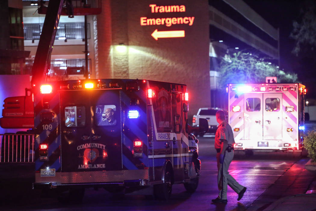 An ambulance rushes to the trauma emergency room at the Sunrise Hospital and Medical Center Monday, Oct. 2, 2017, after a Sunday night shooting on the Strip left 58 dead. Joel Angel Juarez Las Veg ...