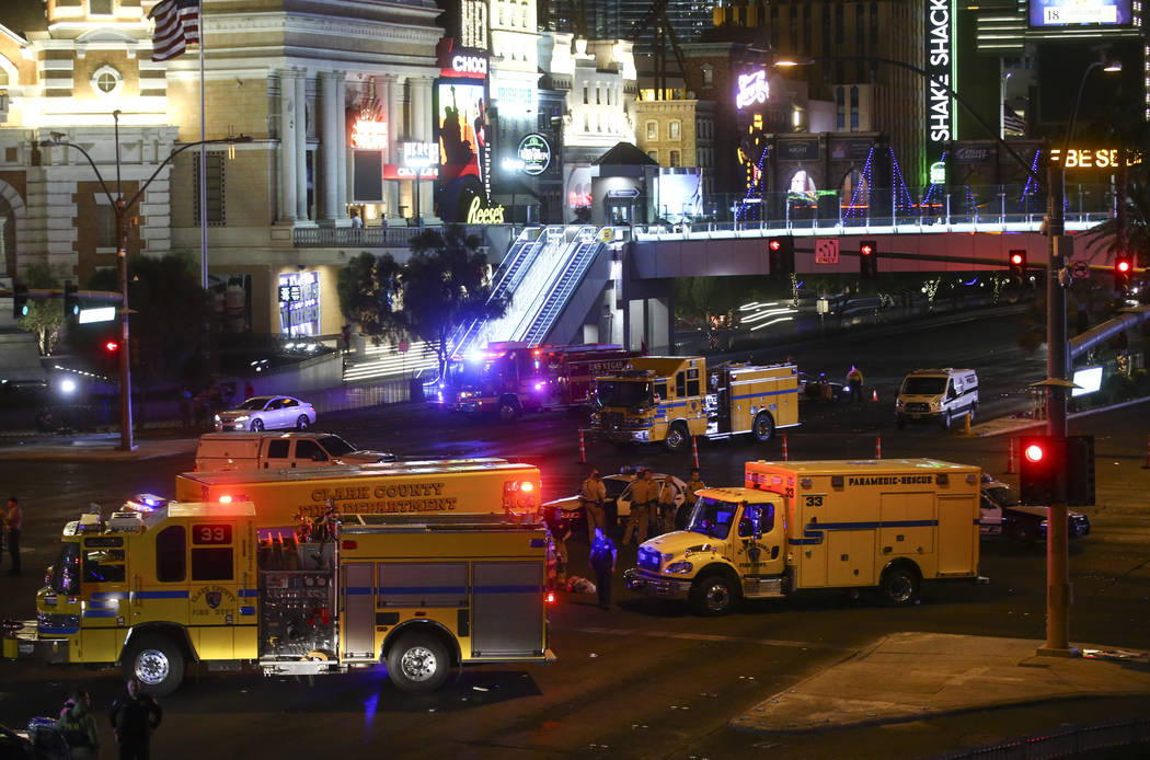 Las Vegas police and emergency vehicles on scene following an active shooter situation that left 50 dead and over 200 injured on the Las Vegas Strip during the early hours of Monday, Oct. 2, 2017. ...