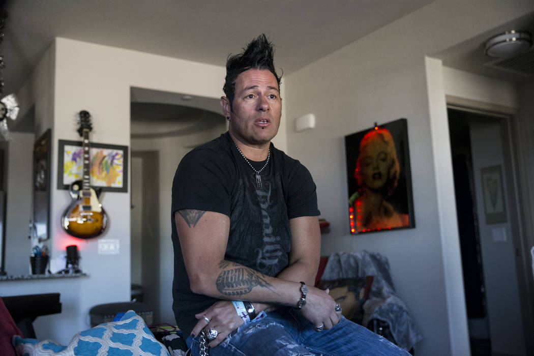 Bryan Hopkins, member of the band Elvis Monroe, and who attended Route 91 festival during the mass shooting last Sunday, share his story at his home in Las Vegas, Thursday, Oct. 5, 2017. Erik Verd ...