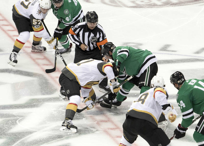 Oct 6, 2017; Dallas, TX, USA; Vegas Golden Knights center Cody Eakin (21) take the first face-off in team history against Dallas Stars center Tyler Seguin (91) at the American Airlines Center. The ...