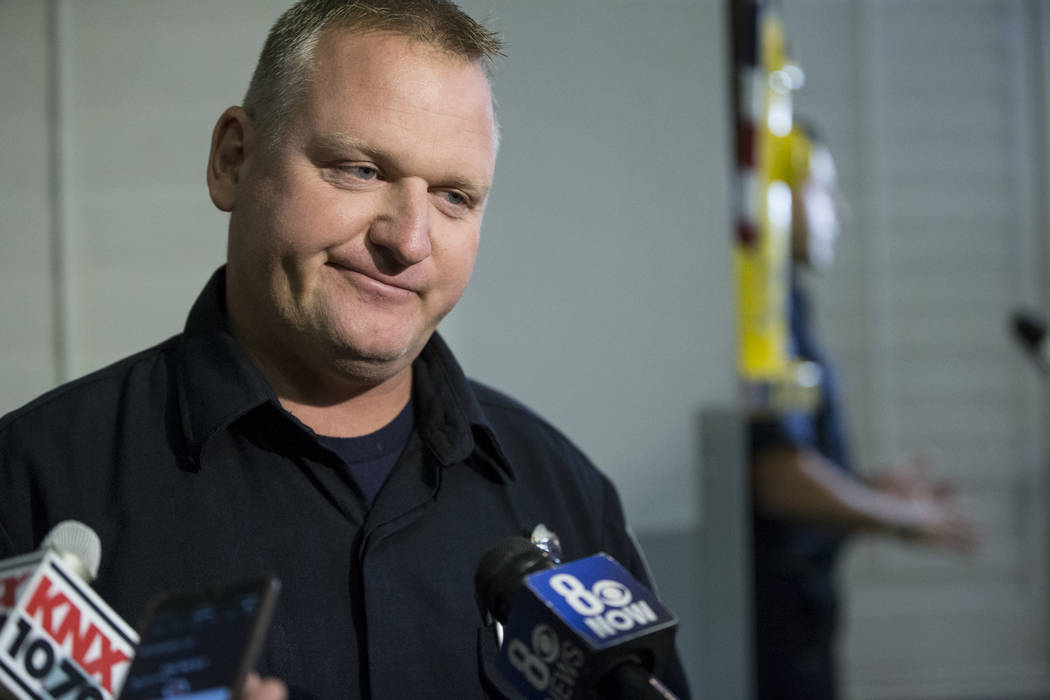 Clark County Firefighter Jeff Koceski is interviewed following a press conference on the fire and emergency medical service response to Sundays' mass shooting, at the Clark County Fire Department  ...
