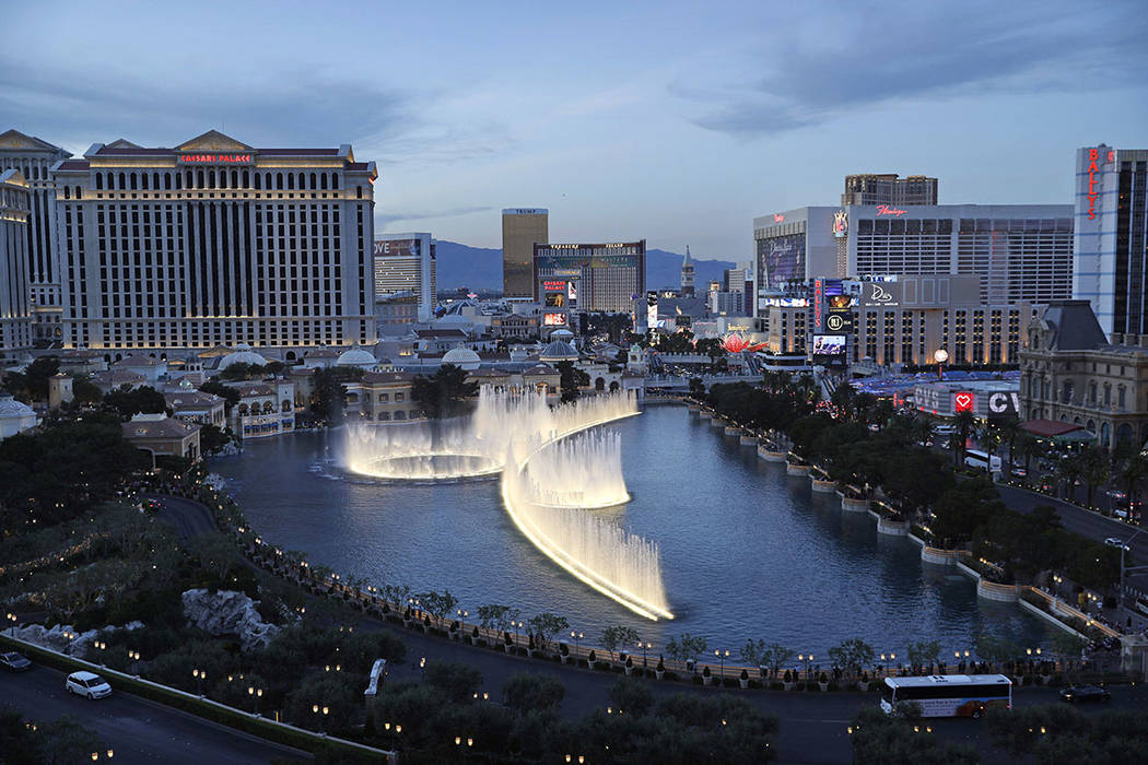 The fountains of Bellagio erupt along the Las Vegas Strip in Las Vegas in April. (AP Photo/John Locher)