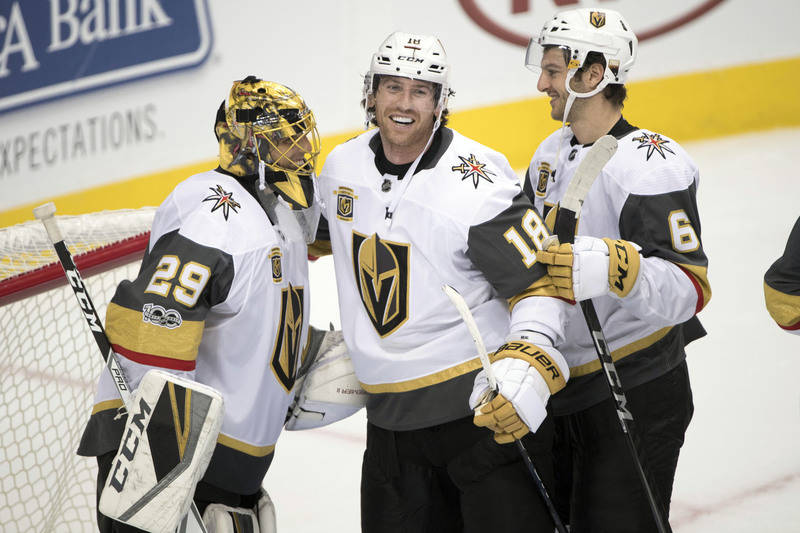 Oct 6, 2017; Dallas, TX, USA; Vegas Golden Knights goalie Marc-Andre Fleury (29) and left wing James Neal (18) and defenseman Colin Miller (6) celebrate the win over the Dallas Stars at the Americ ...