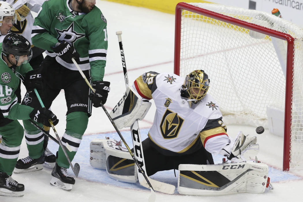 Vegas Golden Knights goalie Marc-Andre Fleury (29) blocks a shot during the second period of an NHL hockey game against the Dallas Stars in Dallas, Friday, Oct. 6, 2017. (AP Photo/LM Otero)