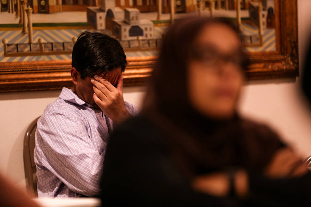 A man sits as he listens to a prayer service at the Masjid Ibrahim mosque in Las Vegas, Monday, Oct. 9, 2017. The service was held in remembrance of the victims of last week's mass shooting at the ...