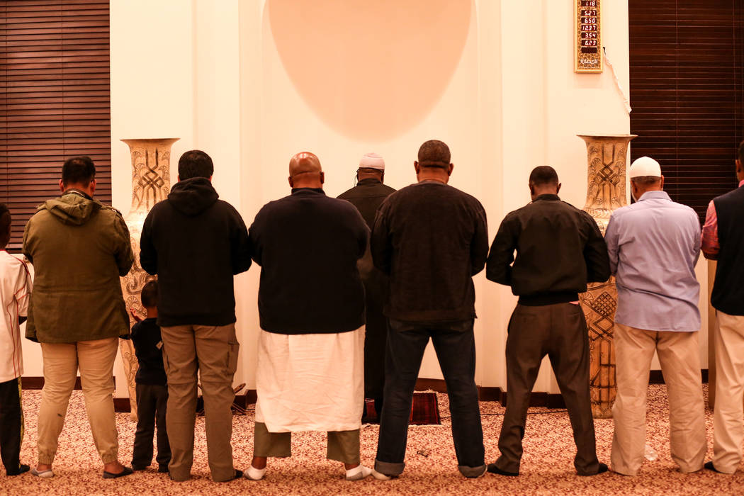 People gather during an evening prayer service at the Masjid Ibrahim mosque in Las Vegas, Monday, Oct. 9, 2017. The service was held in remembrance of the victims of last week's mass shooting at t ...