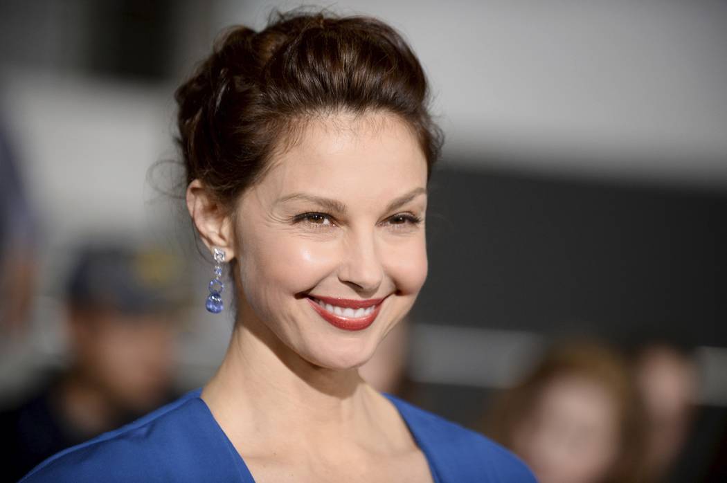 Ashley Judd arrives at the March 18, 2014 world premiere of "Divergent" at the Westwood Regency Village Theater in Los Angeles. The New York Times article chronicled allegations against Weinstein ...