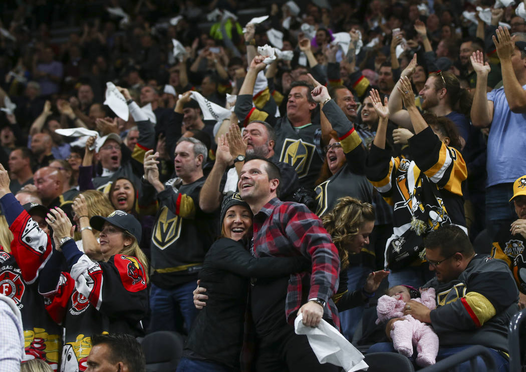 Vegas Golden Knights fans cheer after the first goal of the night, by Tomas Nosek, against the Arizona Coyotes during an NHL hockey game at T-Mobile Arena in Las Vegas on Tuesday, Oct. 10, 2017. C ...