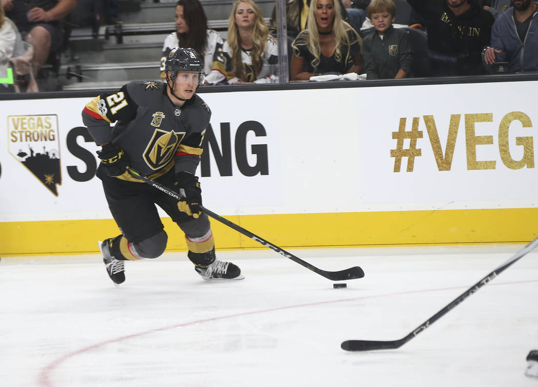 Vegas Golden Knights' Cody Eakin (21) guides the puck during an NHL hockey game against the Arizona Coyotes at T-Mobile Arena in Las Vegas on Tuesday, Oct. 10, 2017. Chase Stevens Las Vegas Review ...