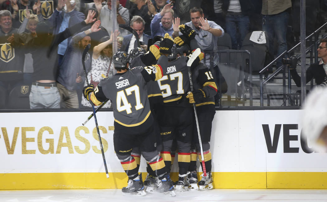 Vegas Golden Knights players celebrate a goal by James Neal against the Arizona Coyotes during an NHL hockey game at T-Mobile Arena in Las Vegas on Tuesday, Oct. 10, 2017. Chase Stevens Las Vegas  ...