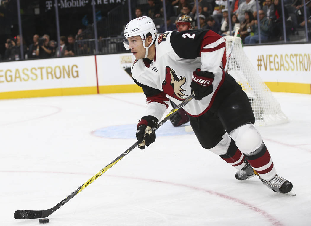 Arizona Coyotes' Luke Schenn (2) guides the puck against the Vegas Golden Knights during an NHL hockey game at T-Mobile Arena in Las Vegas on Tuesday, Oct. 10, 2017. Chase Stevens Las Vegas Review ...