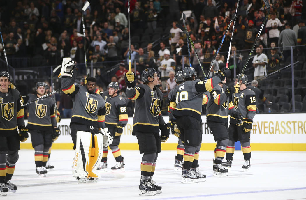 Vegas Golden Knights players celebrate after defeating the Arizona Coyotes 5-2 in an NHL hockey game at T-Mobile Arena in Las Vegas on Tuesday, Oct. 10, 2017. Chase Stevens Las Vegas Review-Journa ...