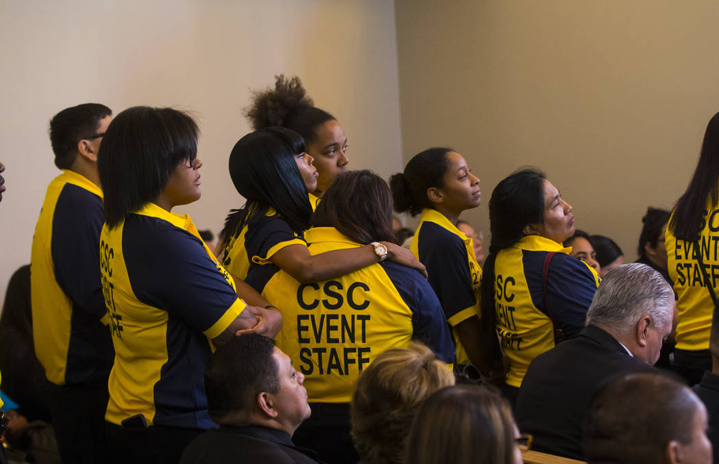 Contemporary Services Corporation employees, many of whom worked with Erick Silva, fill the aisles during funeral services for Erick Silva at Davis Funeral Home & Memorial Park in Las Vegas on ...