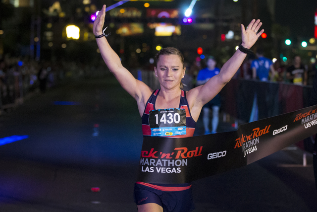 Elaina Schellhaass completes the Rock-n-Roll Marathon in first place for women at the Strip near The Mirage hotel-casino on Sunday, Nov. 13, 2016, in Las Vegas. Erik Verduzco/Las Vegas Review-Jour ...