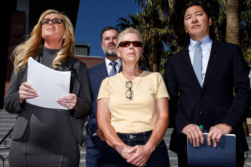 Attorney Christian M. Morris, left, attorney Brian D. Nettles, second from left, Cheryl Sheppard, mother of Rachel Sheppard, second from right, lead attorney James Lee, right, gather in front of t ...
