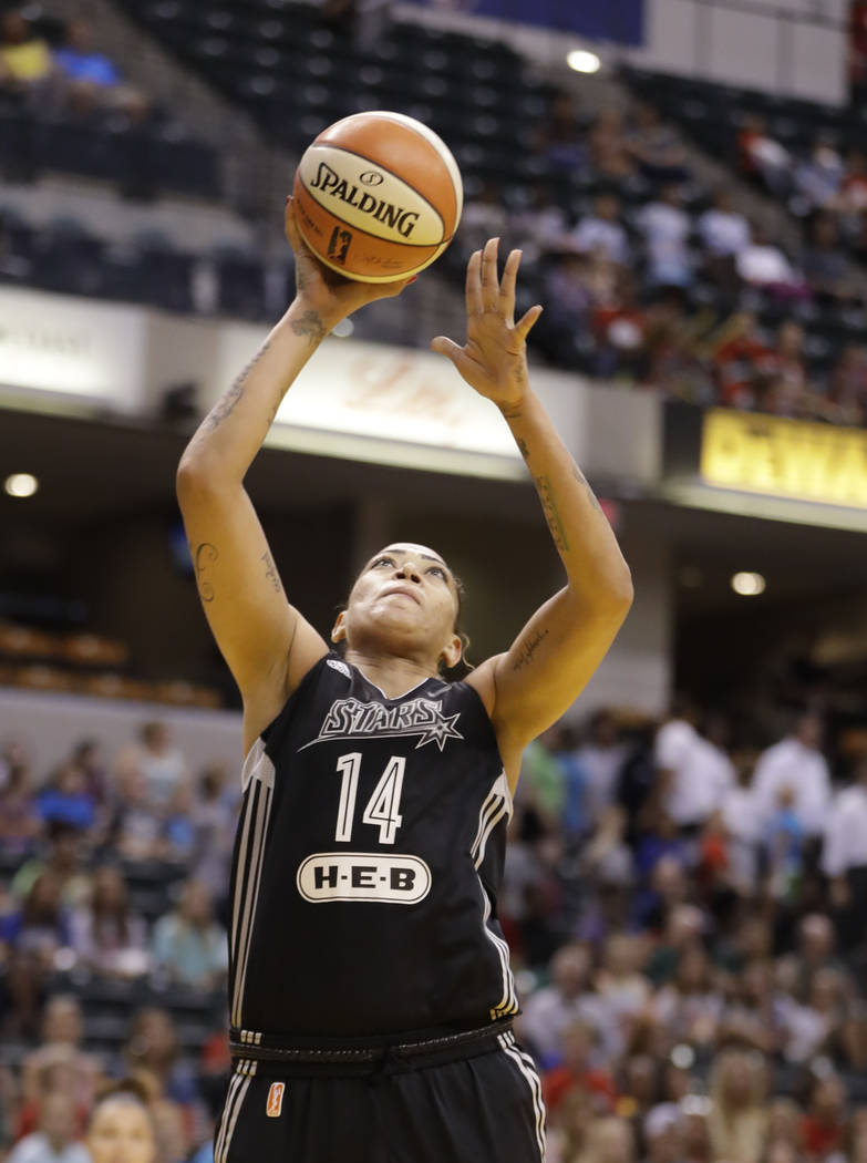 San Antonio Stars' Erika de Souza (14) shoots during the first half of a WNBA basketball game against the Indiana Fever, Wednesday, July 12, 2017, in Indianapolis. (AP Photo/Darron Cummings)