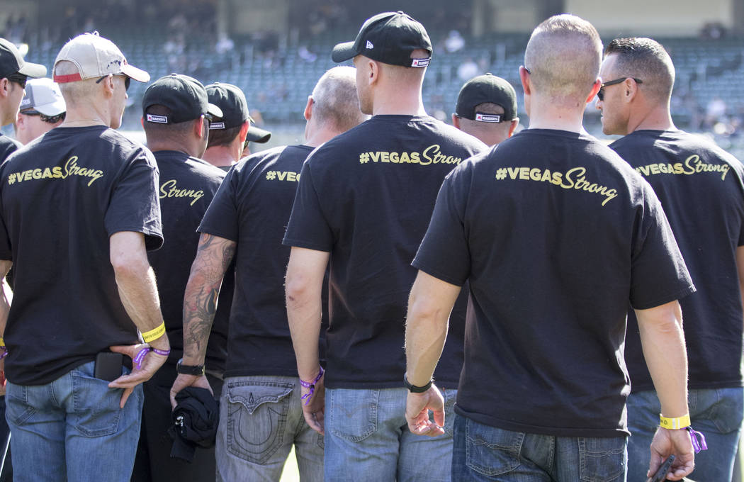 First responders from the Las Vegas shooting have VIP access to the field before the Oakland Raiders game against the Los Angeles Chargers in Oakland, Calif., Sunday, Oct. 15, 2017. Heidi Fang Las ...