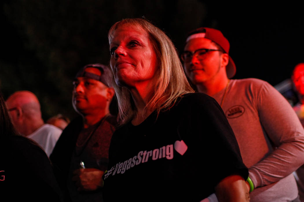 Cindy Padlo of Las Vegas walks along the Strip during the Vegas Strong Las Vegas Strip Walk honoring the victims of the Route 91 Harvest Festival shooting in Las Vegas, Sunday, Oct. 15, 2017. Joel ...