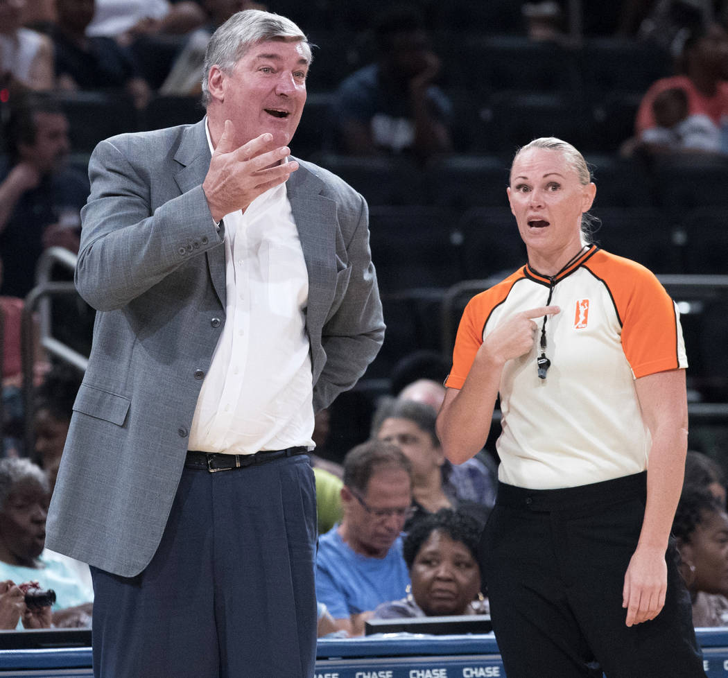 New York Liberty head coach Bill Laimbeer, left, argues with a referee during the first half of a WNBA basketball game against the Connecticut Sun, Wednesday, July 19, 2017 at Madison Square Garde ...