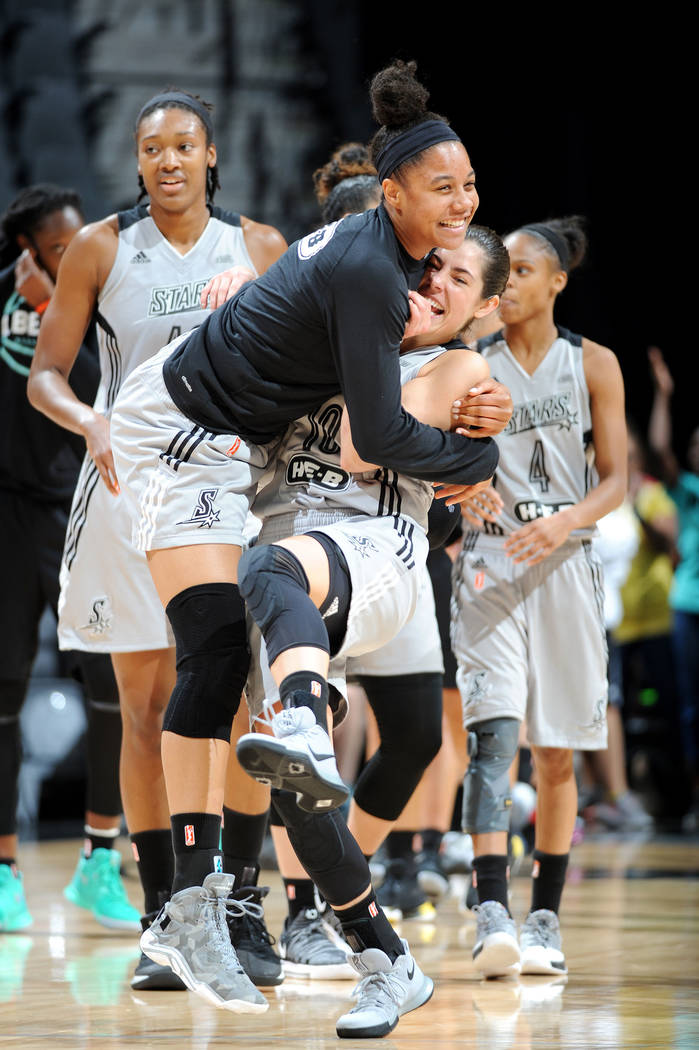 SAN ANTONIO, TX - AUGUST 1: Kelsey Plum #10 of the San Antonio Stars and Nia Coffey #12 of the San Antonio Stars react after the game against the New York Liberty during a WNBA game on August 1, 2 ...