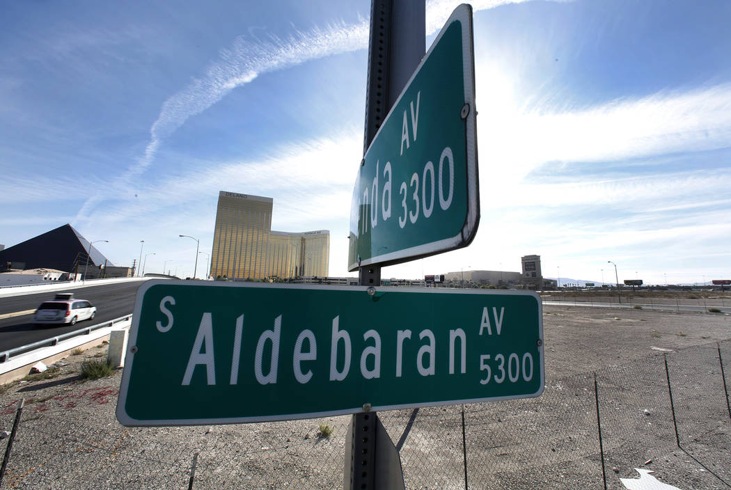Street signs for Aldebaran and Hacienda avenues on the Las Vegas Stadium site Tuesday, Oct. 17, 2017. The Clark County Commission on Wednesday will formally abandon Aldebaran Avenue. Bizuayehu Tes ...