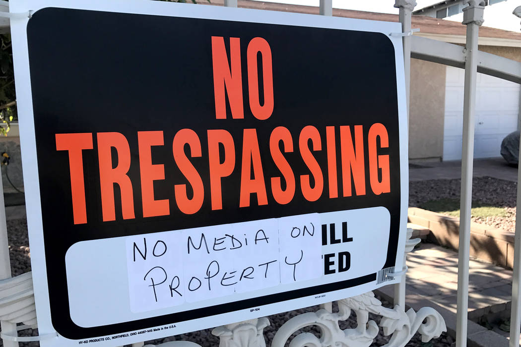 A sign warning members of the news media not to enter Jesus Campos' home in east Las Vegas hangs on a gate on Friday, Oct. 13, 2017. Sandy Lopez Las Vegas Review-Journal