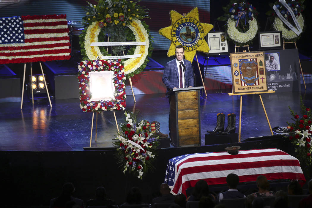 Pastor Jud Wilhite speaks during a funeral for Las Vegas police officer Charleston Hartfield, Friday, Oct. 20, 2017, in Henderson, Nev. Hartfield was killed by a gunman shooting from a hotel into ...