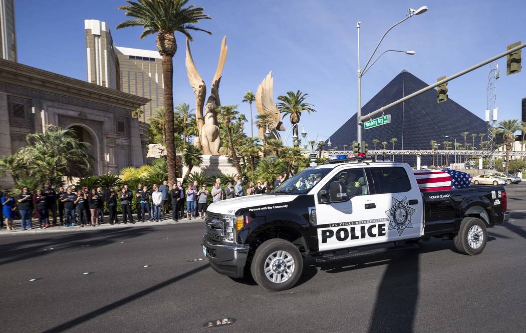 The procession for Metro officer Charleston Hartfield passes by Mandalay Bay en route to a memorial service on Friday, Oct. 20, 2017. Richard Brian Las Vegas Review-Journal @vegasphotograph