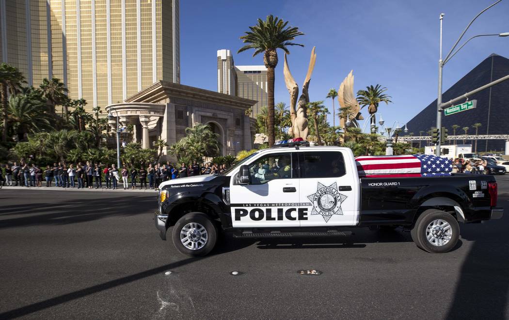 The procession for Metro officer Charleston Hartfield passes by Mandalay Bay en route to a memorial service on Friday, Oct. 20, 2017. Richard Brian Las Vegas Review-Journal @vegasphotograph
