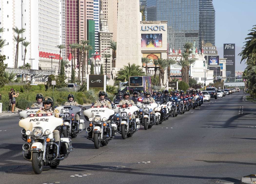 The procession for Metro officer Charleston Hartfield passes by the Luxor en route to a memorial service on Friday, Oct. 20, 2017. Richard Brian Las Vegas Review-Journal @vegasphotograph