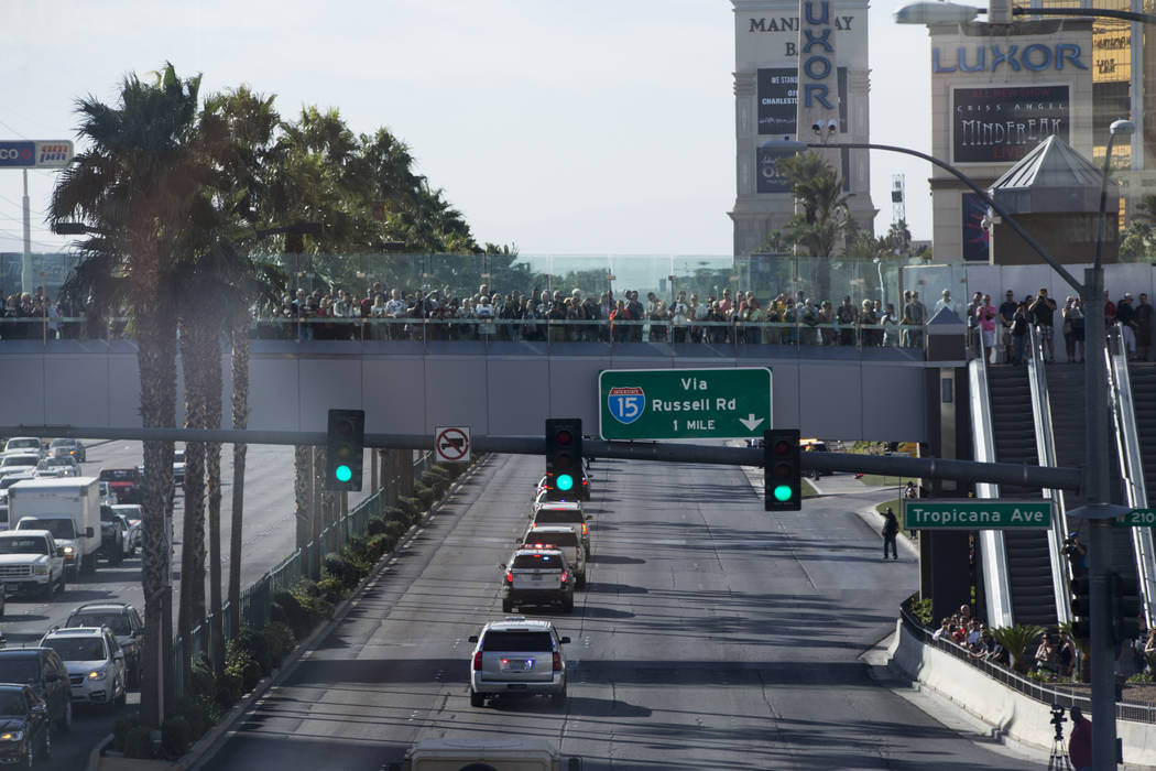 The funeral procession of Las Vegas police officer and Nevada National Guard veteran Charleston Hardfield, at the intersection of Tropicana Ave and Las Vegas Bouelevard in Las Vegas, Friday, Oct. ...