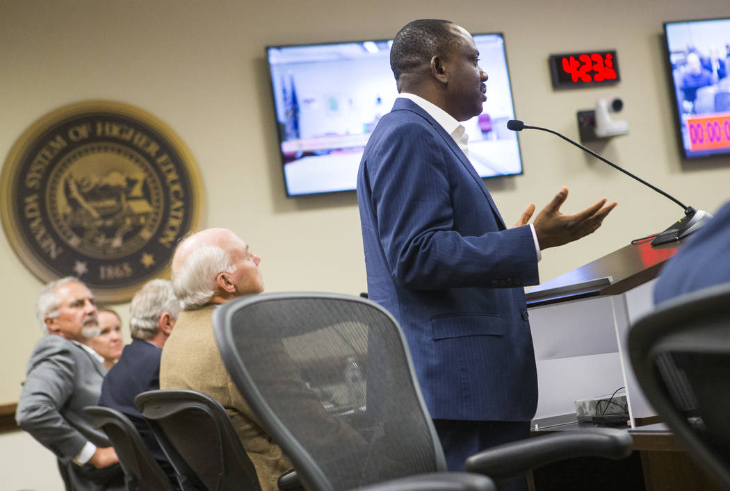 Professor Echezona Ezeanolue, who directs the pediatric HIV program at UNLV's School of Community Health Sciences, speaks during public comment at a meeting of the Nevada Board of Regents at the N ...