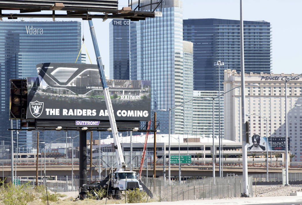 A Raiders billboard is erected on the northeast corner of Dean Martin Drive near Hacienda Avenue on Friday, April 21, 2017, at the proposed Russell Road stadium site in Las Vegas. Heidi Fang/Las V ...