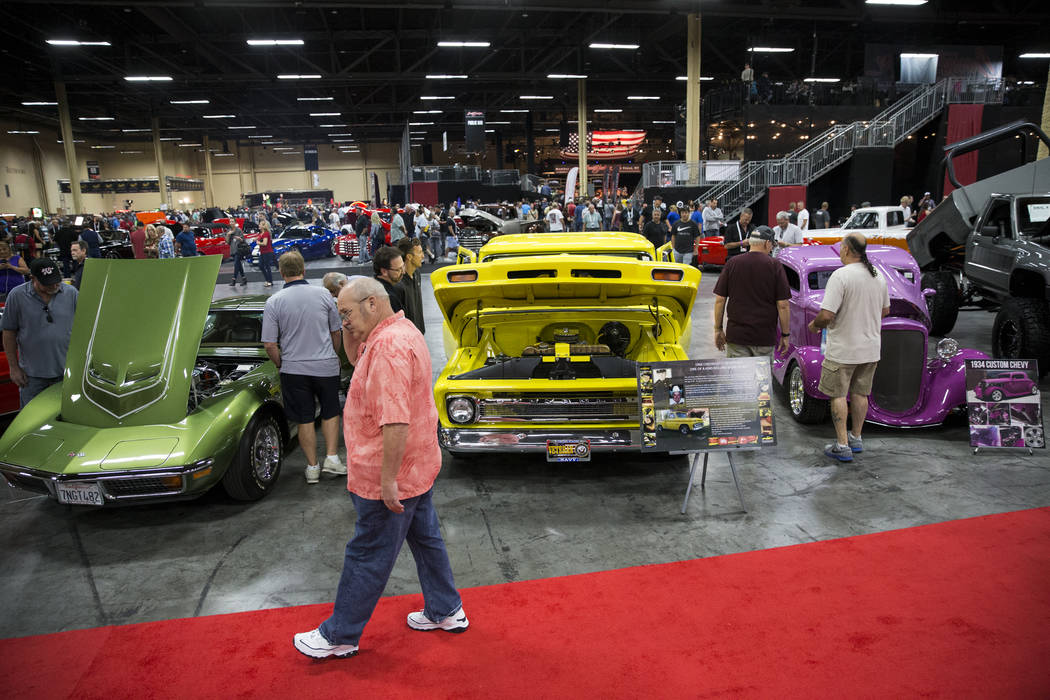 People browse vehicles during the Barrett-Jackson car auction at the Mandalay Bay Convention Center in Las Vegas, Friday, Oct. 20, 2017. Erik Verduzco Las Vegas Review-Journal @Erik_Verduzco