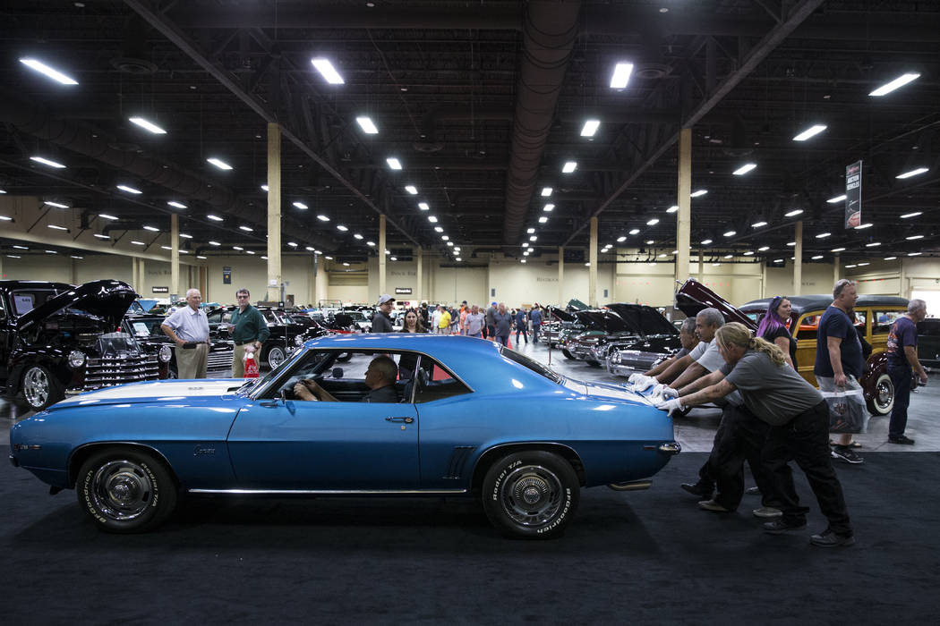 A 1969 Chevrolet Camaro Z/28 is pushed to the line of the  Barrett-Jackson car auction floor at the Mandalay Bay Convention Center in Las Vegas, Friday, Oct. 20, 2017. Erik Verduzco Las Vegas Revi ...